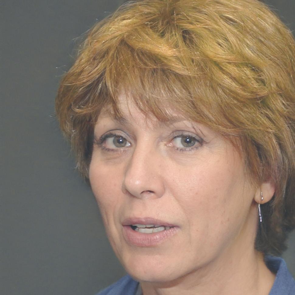 Financial analyst Sarah Liu reviewing business performance metrics