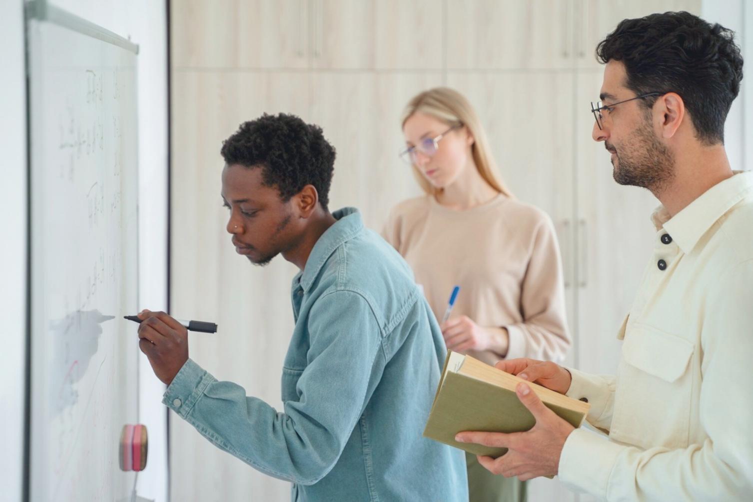 Students working on financial analysis project with real company data